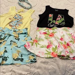 Two short/skirt girls matching sets in size10-12